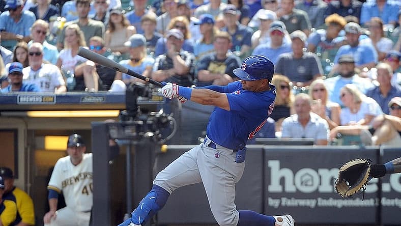 Jul 6, 2022; Milwaukee, Wisconsin, USA; Chicago Cubs center fielder Rafael Ortega (66) hits a one-run RBI single in the eighth inning against the Milwaukee Brewers at American Family Field. Mandatory Credit: Michael McLoone-USA TODAY Sports