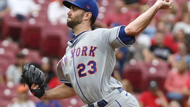 Jul 6, 2022; Cincinnati, Ohio, USA; New York Mets starting pitcher David Peterson (23) throws a pitch against the Cincinnati Reds during the first inning at Great American Ball Park. Mandatory Credit: David Kohl-USA TODAY Sports