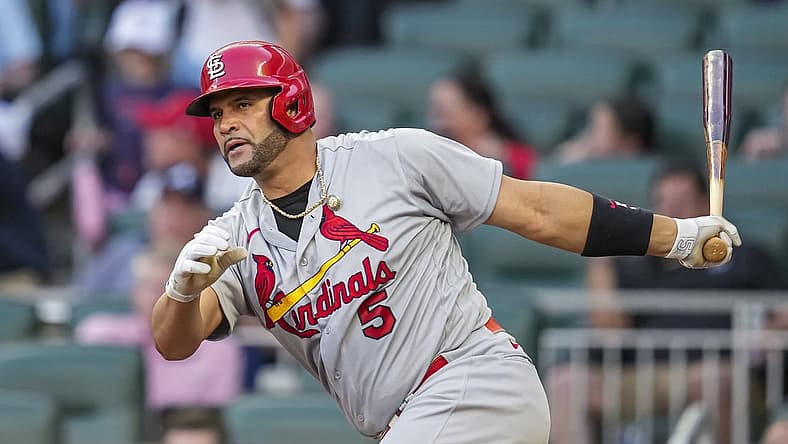 Jul 6, 2022; Cumberland, Georgia, USA; St. Louis Cardinals designated hitter Albert Pujols (5) hits a double against the Atlanta Braves during the fourth inning at Truist Park. Mandatory Credit: Dale Zanine-USA TODAY Sports