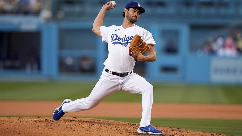 Jul 6, 2022; Los Angeles, California, USA; Los Angeles Dodgers starting pitcher Mitch White (66) throws a pitch in the third inning against the Colorado Rockies at Dodger Stadium. Mandatory Credit: Kirby Lee-USA TODAY Sports