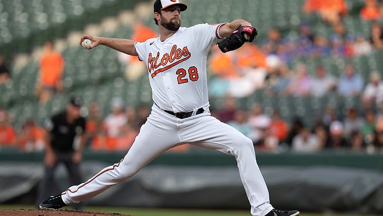 Jul 7, 2022; Baltimore, Maryland, USA; Baltimore Orioles starting pitcher Jordan Lyles (28) pitches against the Los Angeles Angels during the first inning at Oriole Park at Camden Yards. Mandatory Credit: Jessica Rapfogel-USA TODAY Sports