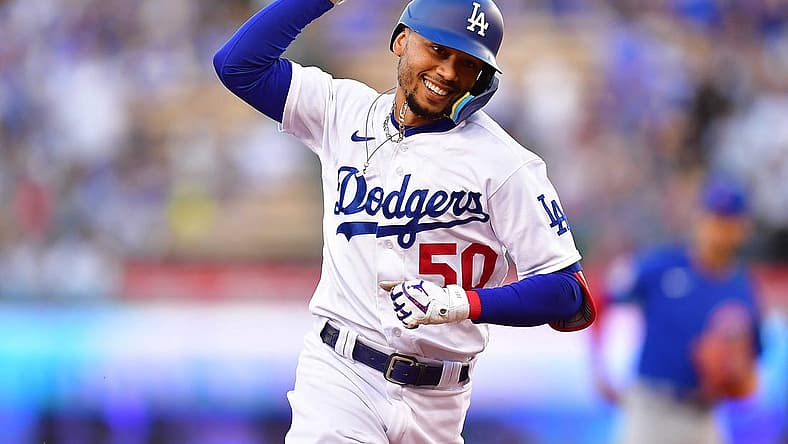 Jul 7, 2022; Los Angeles, California, USA; Los Angeles Dodgers right fielder Mookie Betts (50) runs the bases after hitting a solo home run against the Chicago Cubs during the first inning at Dodger Stadium. Mandatory Credit: Gary A. Vasquez-USA TODAY Sports