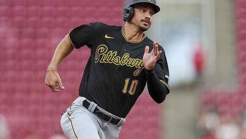 Jul 7, 2022; Cincinnati, Ohio, USA; Pittsburgh Pirates center fielder Bryan Reynolds (10) runs to third on a double hit by designated hitter Daniel Vogelbach (not pictured) in the first inning against against the Cincinnati Reds at Great American Ball Park. Mandatory Credit: Katie Stratman-USA TODAY Sports