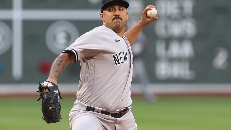 Jul 8, 2022; Boston, Massachusetts, USA; New York Yankees starting pitcher Nestor Cortes (65) throws a pitch against the Boston Red Sox during the first inning at Fenway Park. Mandatory Credit: Paul Rutherford-USA TODAY Sports