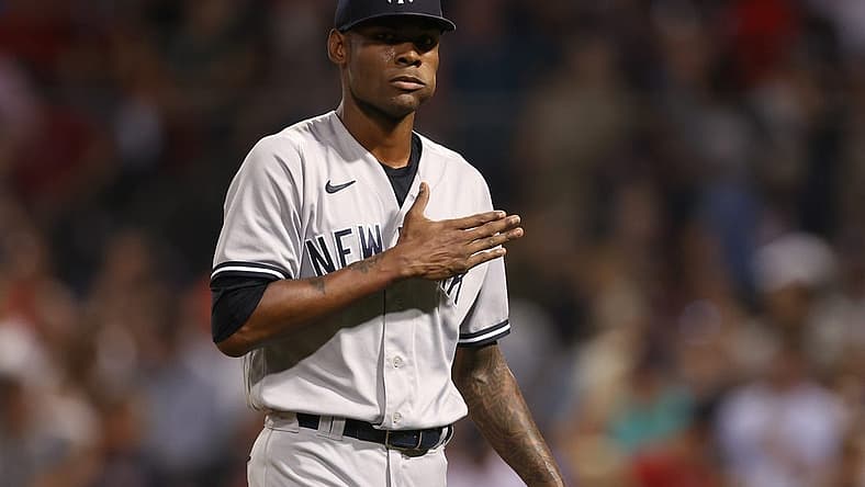 Jul 8, 2022; Boston, Massachusetts, USA; New York Yankees relief pitcher Miguel Castro (30) reacts during the fourth inning against the Boston Red Sox at Fenway Park. Mandatory Credit: Paul Rutherford-USA TODAY Sports