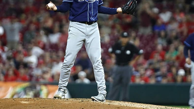 Jul 8, 2022; Cincinnati, Ohio, USA; Tampa Bay Rays relief pitcher Matt Wisler (37) reacts being called for a balk that led to giving up the winning run to the Cincinnati Reds in the tenth inning at Great American Ball Park. Mandatory Credit: David Kohl-USA TODAY Sports