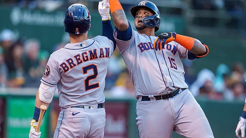 Jul 8, 2022; Oakland, California, USA; Houston Astros catcher Martin Maldonado (15) celebrates with third baseman Alex Bregman (2) after hitting a home run against the Oakland Athletics during the fifth inning at RingCentral Coliseum. Mandatory Credit: Neville E. Guard-USA TODAY Sports
