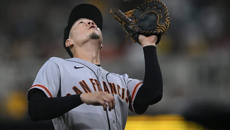 Jul 8, 2022; San Diego, California, USA; San Francisco Giants first baseman Wilmer Flores (41) catches a pop-up in foul territory hit by San Diego Padres right fielder Jose Azocar (not pictured) during the eighth inning at Petco Park. Mandatory Credit: Orlando Ramirez-USA TODAY Sports