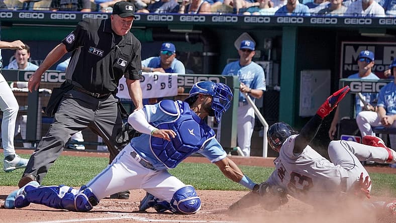 Jul 9, 2022; Kansas City, Missouri, USA; Kansas City Royals catcher MJ Melendez (1) gets the out on Cleveland Guardians right fielder Nolan Jones (33) at home plate in the third inning at Kauffman Stadium. Mandatory Credit: Denny Medley-USA TODAY Sports