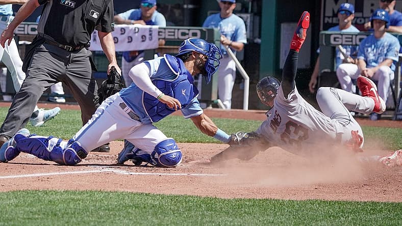 Jul 9, 2022; Kansas City, Missouri, USA; Kansas City Royals catcher MJ Melendez (1) gets the out on Cleveland Guardians right fielder Nolan Jones (33) at home plate in the third inning at Kauffman Stadium. Mandatory Credit: Denny Medley-USA TODAY Sports