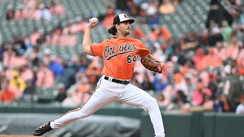 Jul 9, 2022; Baltimore, Maryland, USA; Baltimore Orioles starting pitcher Dean Kremer (64) throws a first inning pitch against the Los Angeles Angels at Oriole Park at Camden Yards. Mandatory Credit: Tommy Gilligan-USA TODAY Sports