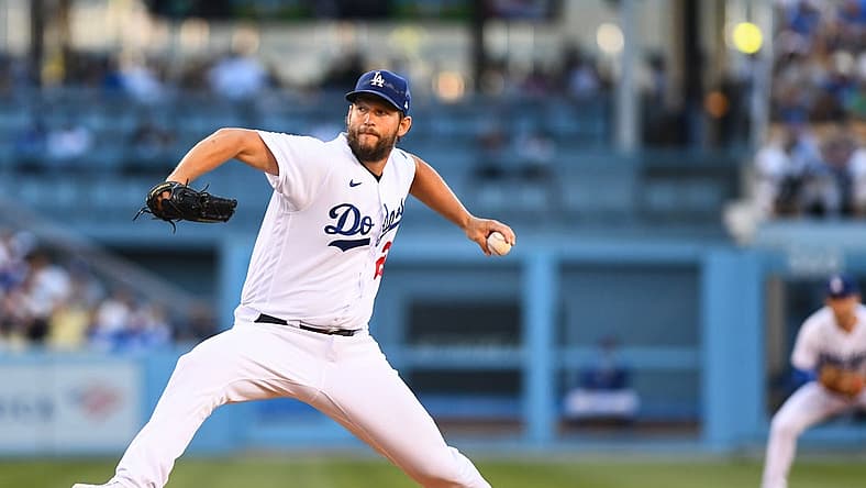 Jul 9, 2022; Los Angeles, California, USA; Los Angeles Dodgers starting pitcher Clayton Kershaw (22) pitches against the Chicago Cubs during the first inning at Dodger Stadium. Mandatory Credit: Jonathan Hui-USA TODAY Sports