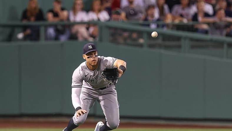 Jul 9, 2022; Boston, Massachusetts, USA; New York Yankees right fielder Aaron Judge (99) catches a line drive during the eighth inning against the Boston Red Sox at Fenway Park. Mandatory Credit: Paul Rutherford-USA TODAY Sports