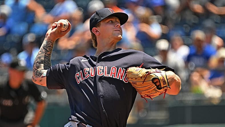Jul 10, 2022; Kansas City, Missouri, USA;  Cleveland Guardians starting pitcher Zach Plesac (34) delivers a pitch during the first inning against the Kansas City Royals at Kauffman Stadium. Mandatory Credit: Peter Aiken-USA TODAY Sports