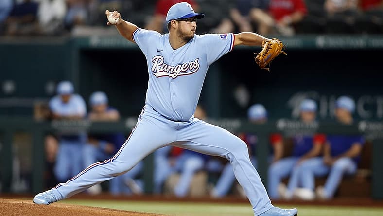 Jul 10, 2022; Arlington, Texas, USA; Texas Rangers starting pitcher Dane Dunning (33) throws a pitch against the Minnesota Twins in the first inning at Globe Life Field. Mandatory Credit: Tim Heitman-USA TODAY Sports