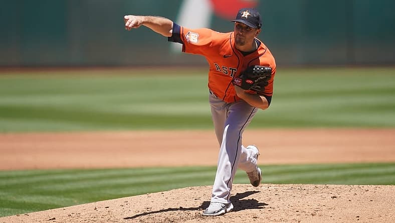 Jul 10, 2022; Oakland, California, USA; Houston Astros pitcher Jake Odorizzi (17) throws a pitch against the Oakland Athletics in the second inning at RingCentral Coliseum. Mandatory Credit: Cary Edmondson-USA TODAY Sports