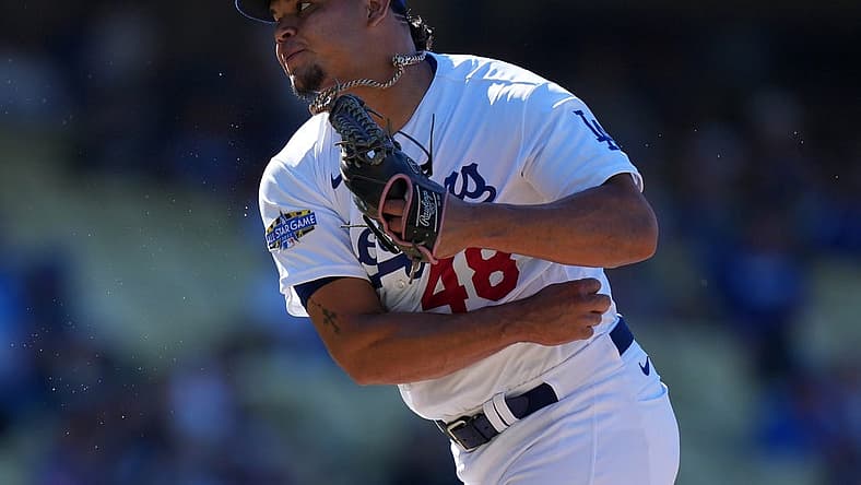 Jul 10, 2022; Los Angeles, California, USA; Los Angeles Dodgers relief pitcher Brusdar Graterol (48) celebrates at the end of the game against the Chicago Cubs at Dodger Stadium. Mandatory Credit: Kirby Lee-USA TODAY Sports