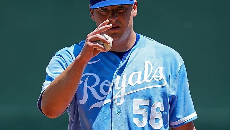 Jul 11, 2022; Kansas City, Missouri, USA; Kansas City Royals starting pitcher Brad Keller (56) signals to the catcher before the first inning against the Detroit Tigers at Kauffman Stadium. Mandatory Credit: Jay Biggerstaff-USA TODAY Sports