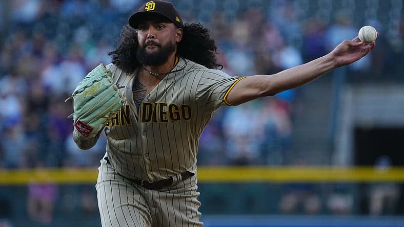 Jul 11, 2022; Denver, Colorado, USA; San Diego Padres starting pitcher Sean Manaea (55) delivers a pitch in the first inning against the Colorado Rockies at Coors Field. Mandatory Credit: Ron Chenoy-USA TODAY Sports