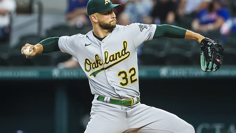 Jul 12, 2022; Arlington, Texas, USA; Oakland Athletics starting pitcher James Kaprielian (32) throws during the first inning against the Texas Rangers at Globe Life Field. Mandatory Credit: Kevin Jairaj-USA TODAY Sports