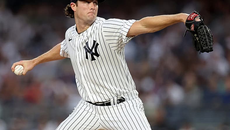 Jul 12, 2022; Bronx, New York, USA; New York Yankees starting pitcher Gerrit Cole (45) pitches against the Cincinnati Reds during the first inning at Yankee Stadium. Mandatory Credit: Brad Penner-USA TODAY Sports