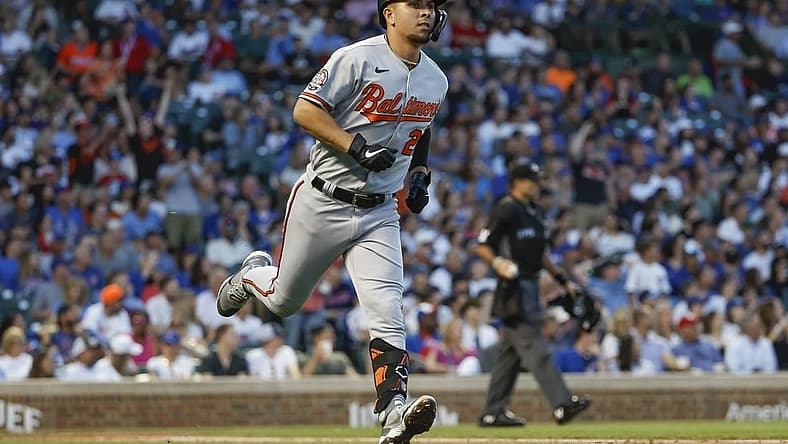Jul 12, 2022; Chicago, Illinois, USA; Baltimore Orioles third baseman Ramon Urias (29) smiles as he rounds the bases after hitting a two-run home run against the Chicago Cubs during the fourth inning at Wrigley Field. Mandatory Credit: Kamil Krzaczynski-USA TODAY Sports