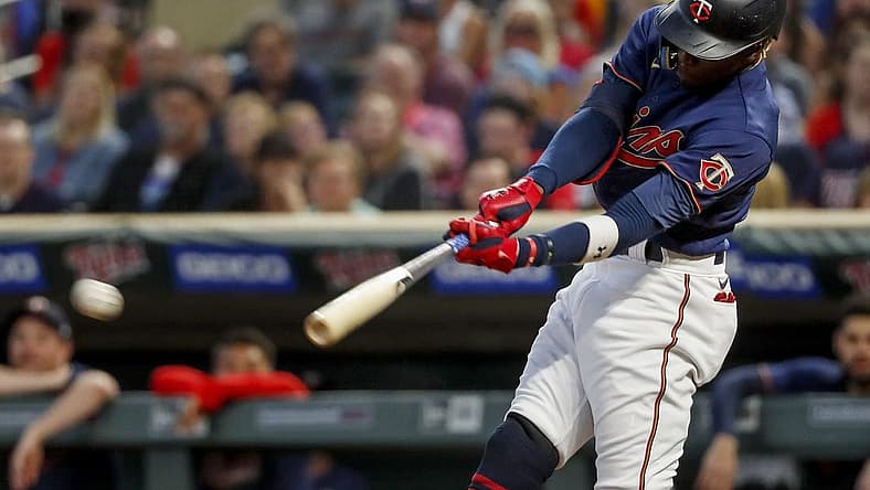 Jul 12, 2022; Minneapolis, Minnesota, USA; Minnesota Twins left fielder Nick Gordon (1) hits an RBI double against the Milwaukee Brewers in the fourth inning to tie the game at Target Field. Mandatory Credit: Bruce Kluckhohn-USA TODAY Sports