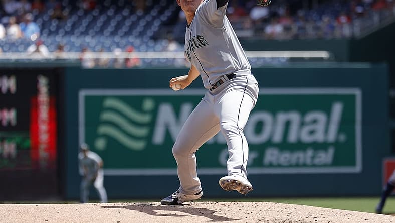 Jul 13, 2022; Washington, District of Columbia, USA; Seattle Mariners starting pitcher Chris Flexen (77) pitches against the Washington Nationals during the first inning at Nationals Park. Mandatory Credit: Geoff Burke-USA TODAY Sports