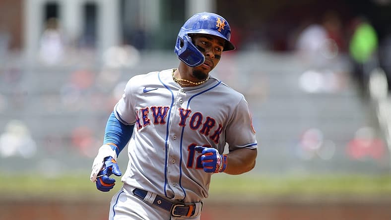 Jul 13, 2022; Atlanta, Georgia, USA; New York Mets shortstop Francisco Lindor (12) rounds third after a three-run home run against the Atlanta Braves in the third inning at Truist Park. Mandatory Credit: Brett Davis-USA TODAY Sports