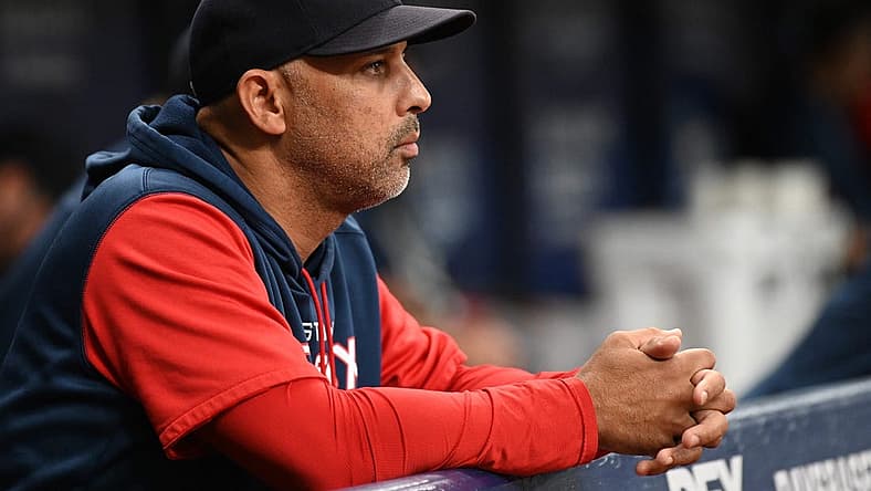 Jul 11, 2022; St. Petersburg, Florida, USA; Boston Red Sox manager Alex Cora (13) looks on in the second inning against the Tampa Bay Rays at Tropicana Field. Mandatory Credit: Jonathan Dyer-USA TODAY Sports