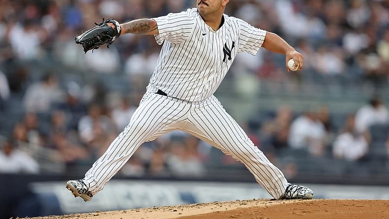 Jul 14, 2022; Bronx, New York, USA; New York Yankees starting pitcher Nestor Cortes (65) pitches against the Cincinnati Reds during the second inning at Yankee Stadium. Mandatory Credit: Brad Penner-USA TODAY Sports