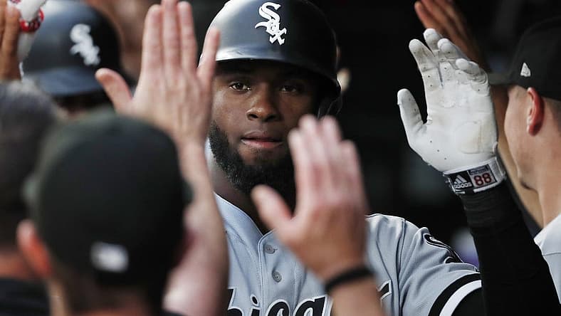 Jul 14, 2022; Minneapolis, Minnesota, USA; Chicago White Sox center fielder Luis Robert (88) celebrates his grand slam home run against the Minnesota Twins in the fourth inning at Target Field. Mandatory Credit: Bruce Kluckhohn-USA TODAY Sports