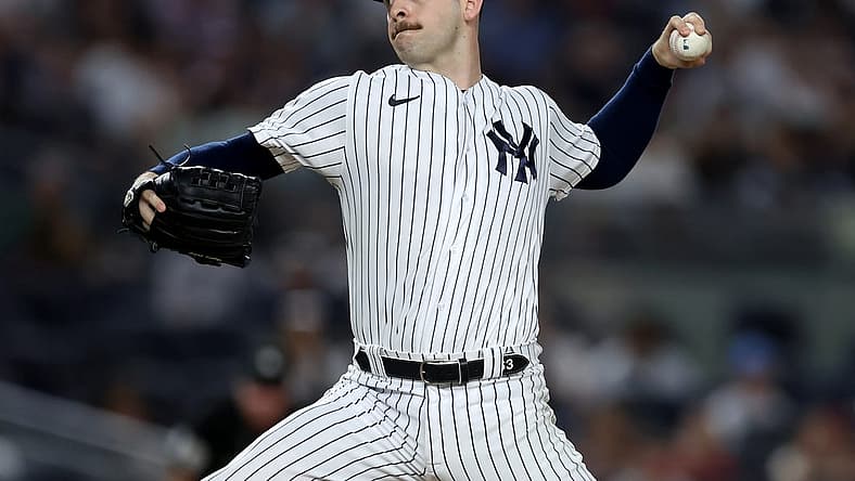 Jul 14, 2022; Bronx, New York, USA; New York Yankees relief pitcher Lucas Luetge (63) pitches against the Cincinnati Reds during the tenth inning at Yankee Stadium. Mandatory Credit: Brad Penner-USA TODAY Sports