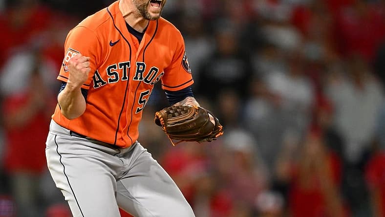 Jul 14, 2022; Anaheim, California, USA;   Houston Astros relief pitcher Ryan Pressly (55) celebrates after striking out Los Angeles Angels left fielder Brandon Marsh (16) and earning a win in the 10th inning at Angel Stadium. Mandatory Credit: Jayne Kamin-Oncea-USA TODAY Sports