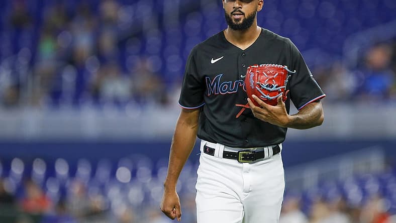 Jul 15, 2022; Miami, Florida, USA; Miami Marlins starting pitcher Sandy Alcantara (22) returns to the dugout after the first inning of the game against the Philadelphia Phillies at loanDepot Park. Mandatory Credit: Sam Navarro-USA TODAY Sports