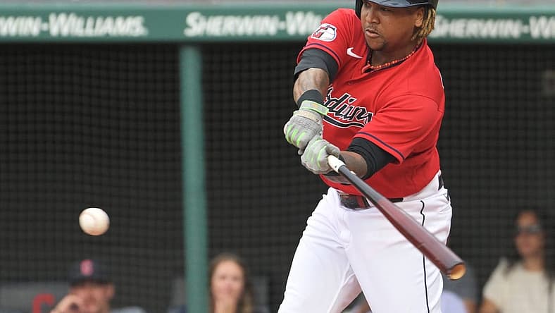 Jul 15, 2022; Cleveland, Ohio, USA; Cleveland Guardians third baseman Jose Ramirez (11) hits an RBI single during the first inning against the Detroit Tigers at Progressive Field. Mandatory Credit: Ken Blaze-USA TODAY Sports