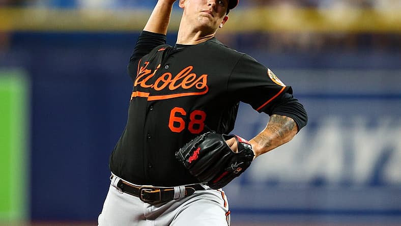Jul 15, 2022; St. Petersburg, Florida, USA;  Baltimore Orioles starting pitcher Tyler Wells (68) throws against the Tampa Bay Rays in the second inning at Tropicana Field. Mandatory Credit: Nathan Ray Seebeck-USA TODAY Sports