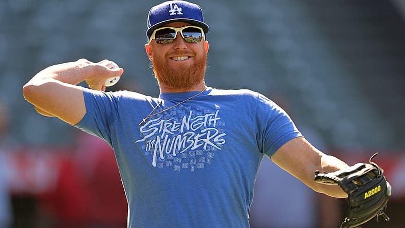 Jul 15, 2022; Anaheim, California, USA; Los Angeles Dodgers third baseman Justin Turner (10) warms up before the game against the Los Angeles Angels at Angel Stadium. Mandatory Credit: Jayne Kamin-Oncea-USA TODAY Sports