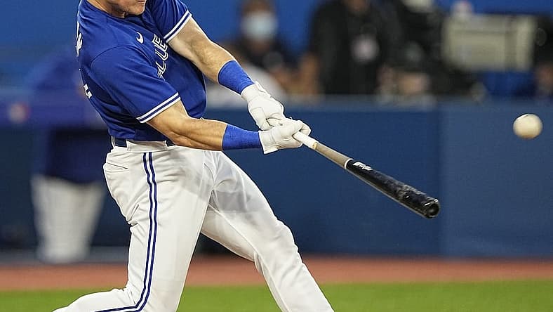 Jul 15, 2022; Toronto, Ontario, CAN; Toronto Blue Jays third baseman Matt Chapman (26) hits a three run home run against the Kansas City Royals during the fifth inning at Rogers Centre. Mandatory Credit: John E. Sokolowski-USA TODAY Sports
