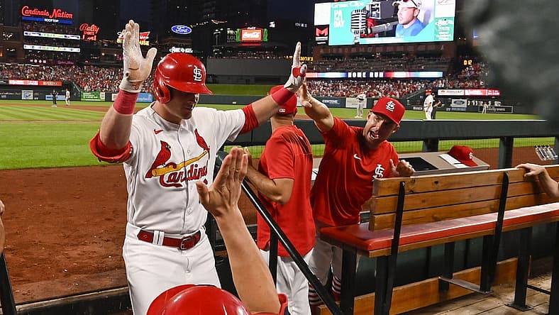 Jul 15, 2022; St. Louis, Missouri, USA; St. Louis Cardinals designated hitter Nolan Gorman (16) is congratulated by bench coach Skip Schumaker (55) after hitting a solo home run against the Cincinnati Reds during the fourth inning at Busch Stadium. Mandatory Credit: Jeff Curry-USA TODAY Sports