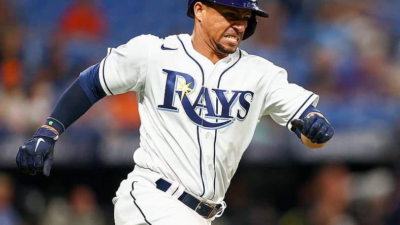 Jul 15, 2022; St. Petersburg, Florida, USA;  Tampa Bay Rays catcher Francisco Mejia (21) hits an RBI double against the Baltimore Orioles in the sixth inning at Tropicana Field. Mandatory Credit: Nathan Ray Seebeck-USA TODAY Sports