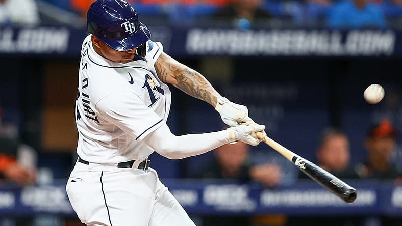 Jul 15, 2022; St. Petersburg, Florida, USA;  Tampa Bay Rays first baseman Christian Bethancourt (14) hits a two-run home run against the Baltimore Orioles in the sixth inning at Tropicana Field. Mandatory Credit: Nathan Ray Seebeck-USA TODAY Sports
