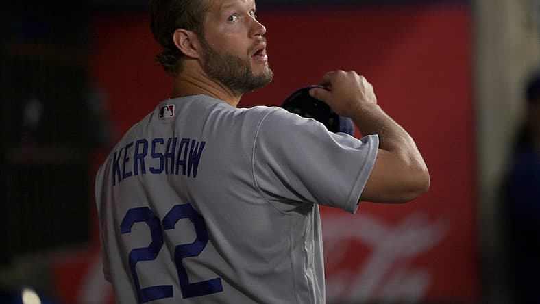 Jul 15, 2022; Anaheim, California, USA; Los Angeles Dodgers starting pitcher Clayton Kershaw (22) waits in the dugout during the fifth inning against the Los Angeles Angels at Angel Stadium. Mandatory Credit: Jayne Kamin-Oncea-USA TODAY Sports