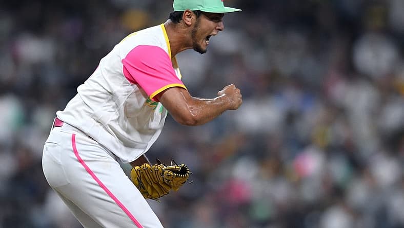 Jul 15, 2022; San Diego, California, USA; San Diego Padres starting pitcher Yu Darvish (11) reacts after a strikeout to end the top of the seventh inning against the Arizona Diamondbacks at Petco Park. Mandatory Credit: Orlando Ramirez-USA TODAY Sports
