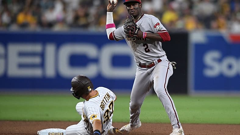 Jul 16, 2022; San Diego, California, USA; Arizona Diamondbacks shortstop Geraldo Perdomo (2) throws to first base after forcing out San Diego Padres second baseman Matthew Batten (37) at second base during the seventh inning at Petco Park. Mandatory Credit: Orlando Ramirez-USA TODAY Sports