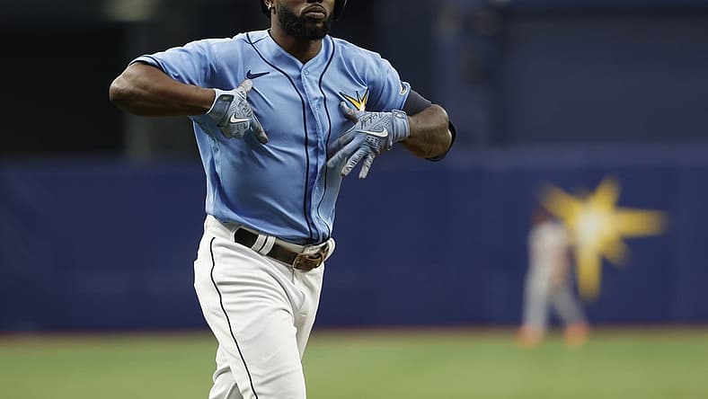 Jul 17, 2022; St. Petersburg, Florida, USA; Tampa Bay Rays left fielder Randy Arozarena (56) celebrates after he hits a two-run home run against the Baltimore Orioles during the first inning at Tropicana Field. Mandatory Credit: Kim Klement-USA TODAY Sports