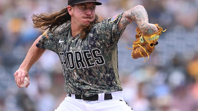 Jul 17, 2022; San Diego, California, USA; San Diego Padres starting pitcher Mike Clevinger (52) throws a pitch against the Arizona Diamondbacks during the first inning at Petco Park. Mandatory Credit: Orlando Ramirez-USA TODAY Sports