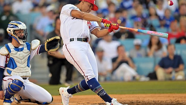 Jul 18, 2022; Los Angeles, CA, USA; Washington Nationals right fielder Juan Soto (22) hits in the final round during the 2022 Home Run Derby at Dodgers Stadium. Mandatory Credit: Jayne Kamin-Oncea-USA TODAY Sports