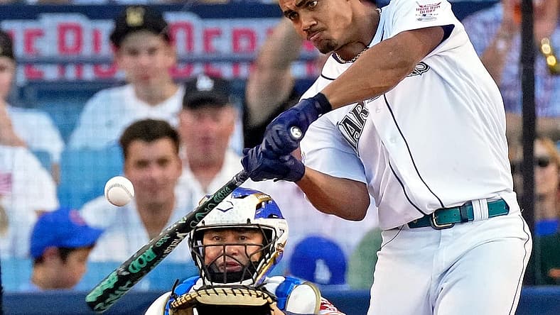 Jul 18, 2022; Los Angeles, CA, USA; Seattle Mariners center fielder Julio Rodriguez (44) hits in the final round during the 2022 Home Run Derby at Dodgers Stadium. Mandatory Credit: Robert Hanashiro-USA TODAY Sports