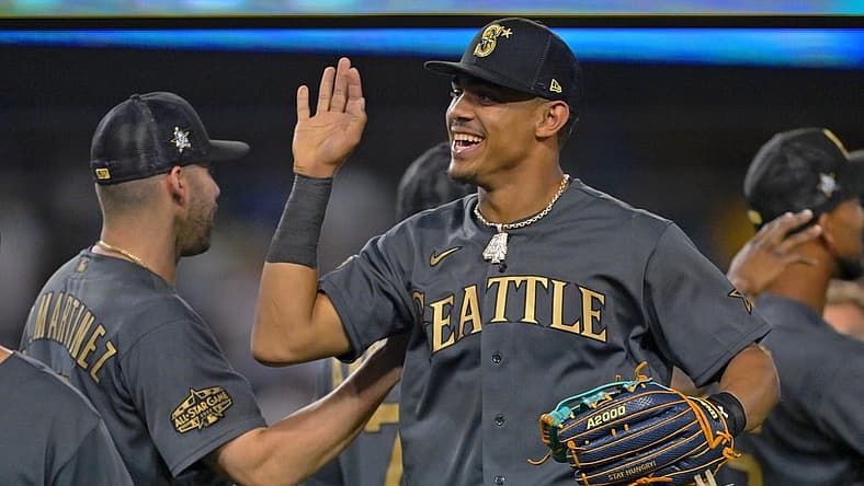Jul 19, 2022; Los Angeles, California, USA; American League outfielder Julio Rodriguez (44) of the Seattle Mariners celebrates after winning the 2022 MLB All Star Game at Dodger Stadium. Mandatory Credit: Jayne Kamin-Oncea-USA TODAY Sports